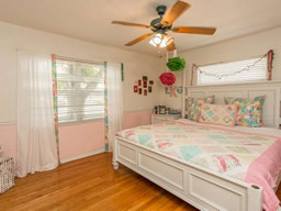 This second bedroom is spacious and bright.