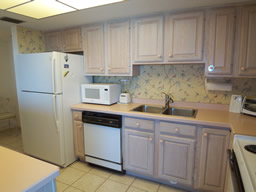 Centrally located, the kitchen is bright and efficient.